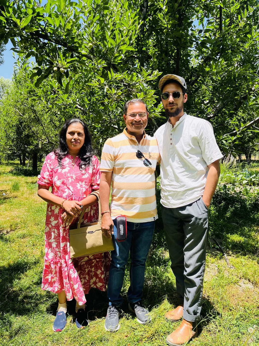 A family on tour in a Kashmir garden